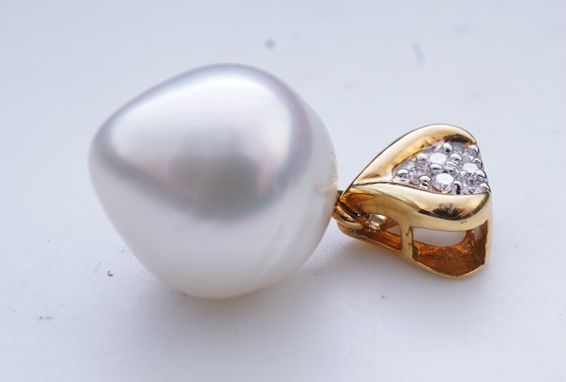 A cultured pearl and diamond pendant